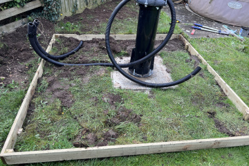 Laying the conduit in the trenches