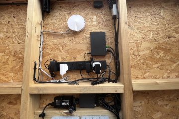 Power socket block with ethernet and wifi hubs. Security camera fitted in top left too