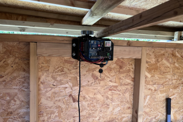Bolting the gate opener to the wall